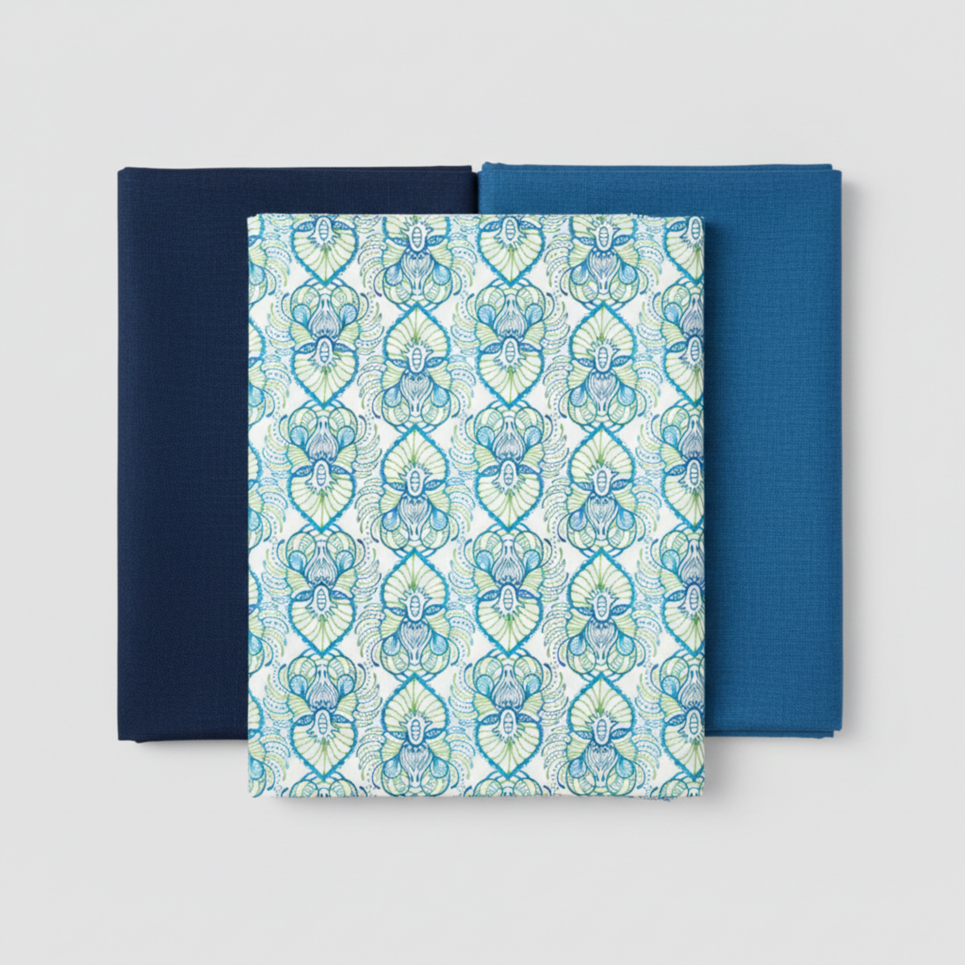 Wonders Of The Ocean Abstract quilting cotton fabric by Jason Yenter for In The Beginning Fabrics shown in a coordinate stack with Interwoven Ocean and blenders – allover ogee trellis lattice with Art Nouveau botanical medallions in turquoise, cobalt blue, and chartreuse green on white, 100% cotton, 3 yard cut