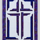 The Wondrous Cross handmade wall quilt with a purple cross, blue accents, a white patterned background, and a wide purple batik border against light grey.