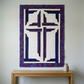 The Wondrous Cross purple, blue, and white wall quilt displayed above an oak console with a cream ceramic vase.