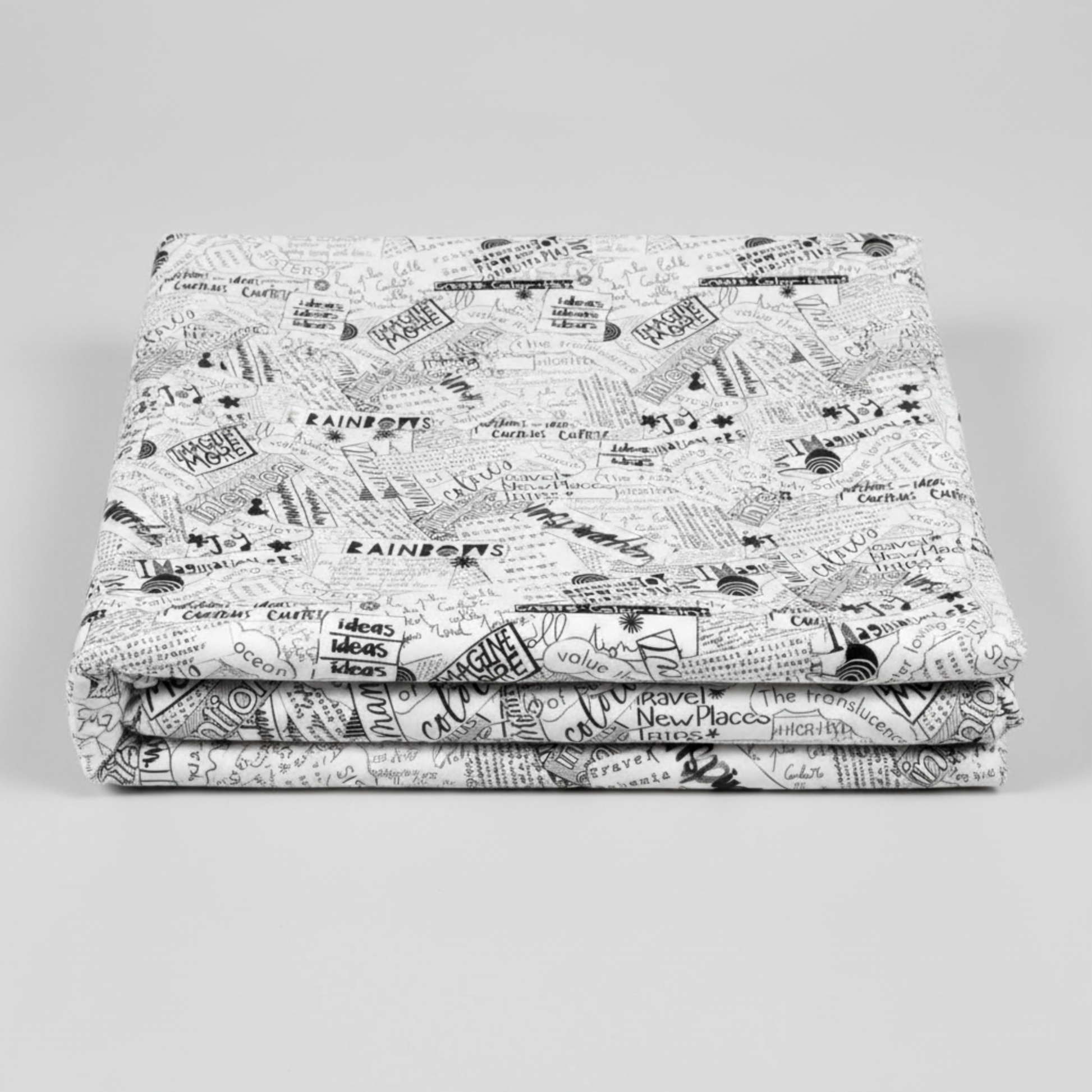 Writing on the Wall Word Collage White quilting cotton in soft fold stack — black and white word collage typography on white, FreeSpirit Fabrics